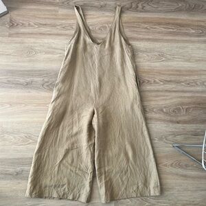 OZMA Jumpsuit putty color XS 100% linen relaxed fit. V neck on back and front.